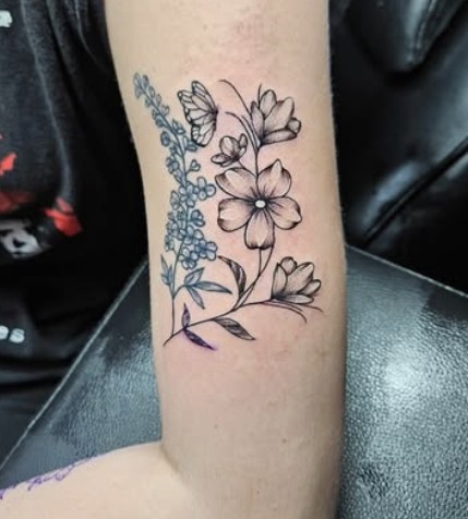 Floral fine line tattoo by Lazaro